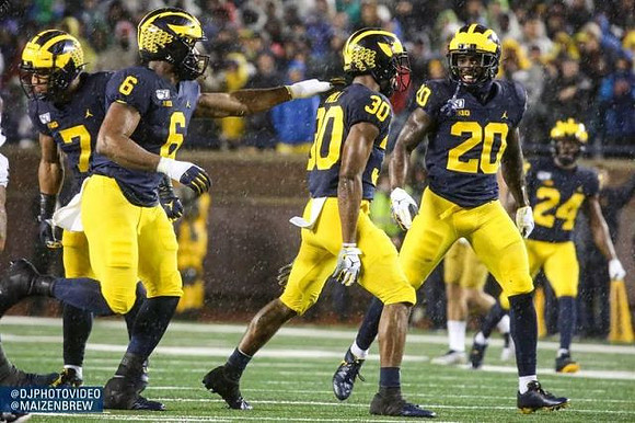 Khaleke Hudson (7), Josh Uche (6), Daxton Hill (30), Brad Hawkins (20), and Lavert Hill (24)