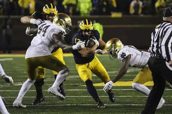 Ryan Hayes (76) and Tru Wilson (13)