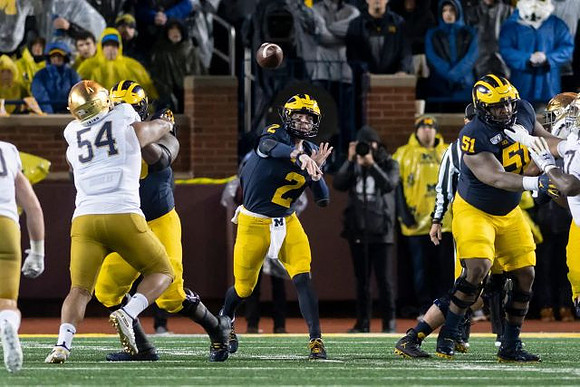 Michael Onwenu (50), Shea Patterson (2), and Cesar Ruiz (51)