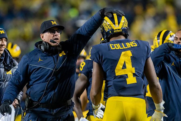 Jim Harbaugh and Nico Collins (4)