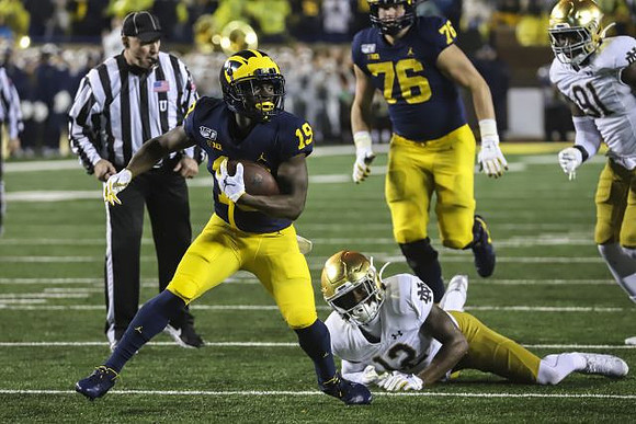 Tru Wilson (13) and Ryan Hayes (76)