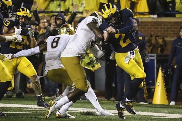 Tru Wilson (13) and Shea Patterson (2)