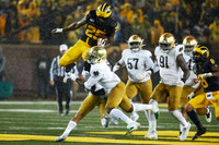 Hassan Haskins (25) and Ronnie Bell (8)