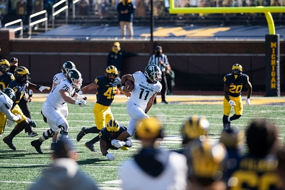 Kwity Paye (19), Adam Shibley (45), and Brad Hawkins (20)