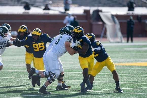 Donovan Jeter (95), Kwity Paye (19), and Josh Ross (12)