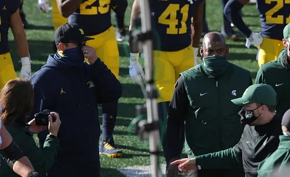 Jim Harbaugh and Michigan State Head Coach Mel Tucker