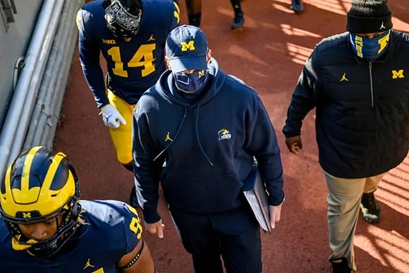Roman Wilson (14) and Jim Harbaugh