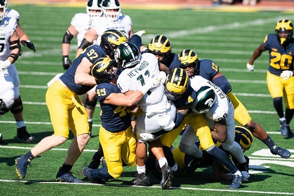 Aidan Hutchinson (97), Adam Shibley (45), Vincent Gray (4), Josh Ross (12), and Brad Hawkins (20)