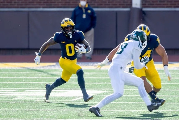 Giles Jackson (0) and Zach Charbonnet (24)