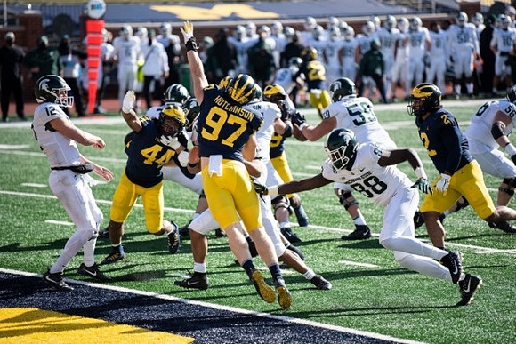 Cameron McGrone (44), Aidan Hutchinson (97), Kwity Paye (19), and Carlo Kemp (2)