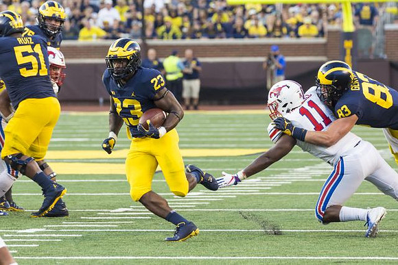 Cesar Ruiz (51), O'Maury Samuels (23), and Zach Gentry (83)