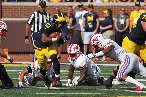 Chris Evans (12) and Ben Bredeson (74)