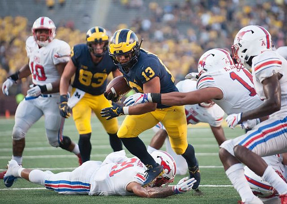 Zach Gentry (83) and Tru Wilson (13)