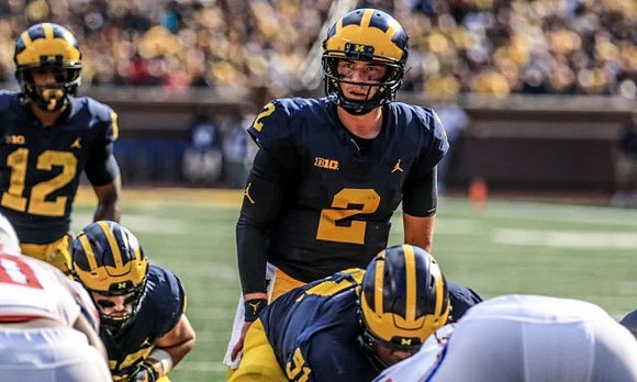 Chris Evans (12), Ben Mason (42), Shea Patterson (2), and Cesar Ruiz (51)