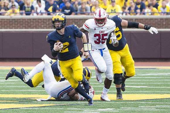 Shea Patterson (2) and Jon Runyan Jr. (75)