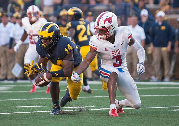 Josh Metellus (14) and Lavert Hill (24)