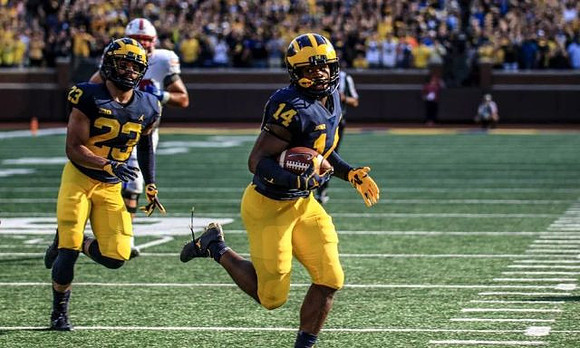 Tyree Kinnel (23) and Josh Metellus (14)