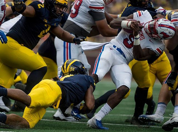 Carlo Kemp (2) and Khaleke Hudson (7)