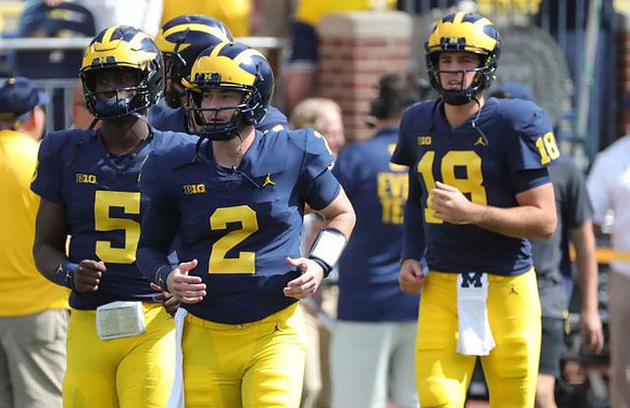 Joe Milton (5), Shea Patterson (2), and Brandon Peters (18)