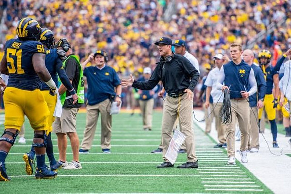 Cesar Ruiz (51), Greg Mattison, and Jim Harbaugh