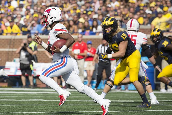 Chase Winovich (15) and Devin Gil (36)