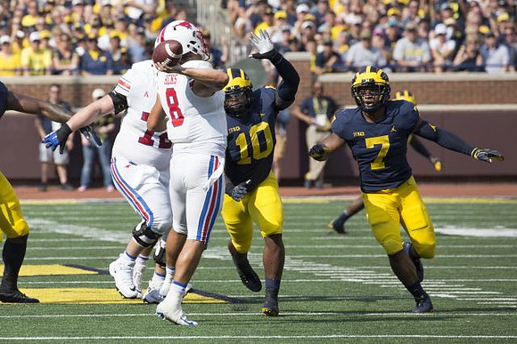 Devin Bush (10) and Khaleke Hudson (7)