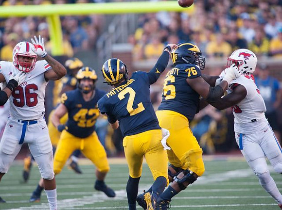 Ben Mason (42), Shea Patterson (2), and Juwann Bushell-Beatty (76)