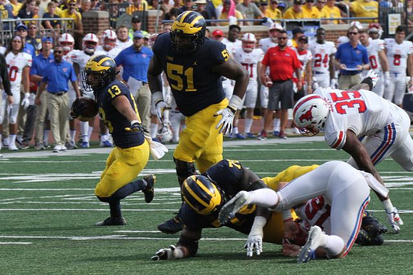 Chris Evans (12), Cesar Ruiz (51), and Juwann Bushell-Beatty (76)