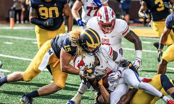 Bryan Mone (90), Chase Winovich (15), and Rashan Gary (3)