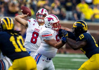 Devin Bush (10) and Kwity Paye (19)