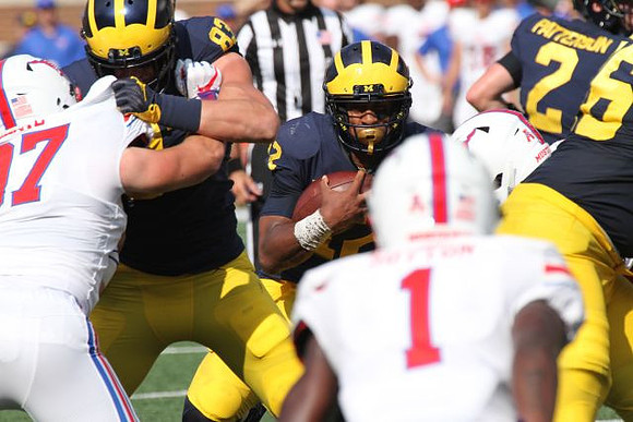 Zach Gentry (83), Chris Evans (12), and Shea Patterson (2)