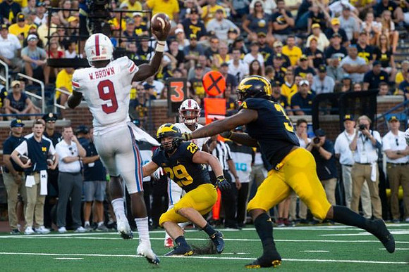 Jordan Glasgow (29) and Rashan Gary (3)
