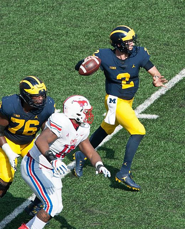 Juwann Bushell-Beatty (76) and Shea Patterson (2)