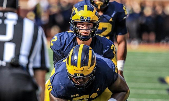 Cesar Ruiz (51), Shea Patterson (2), and Chris Evans (12)