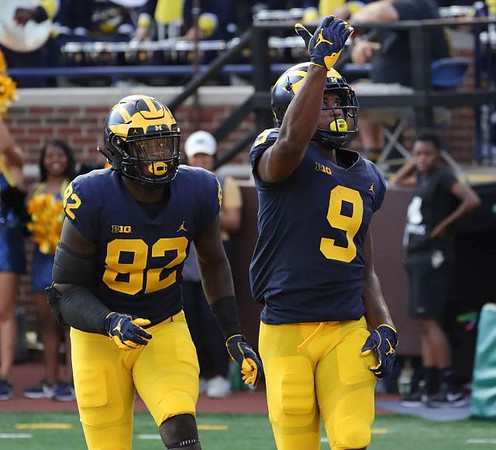 Nick Eubanks (82) and Donovan Peoples-Jones (9)