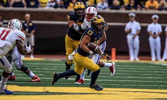 Tru Wilson (13) and Jon Runyan Jr. (75)