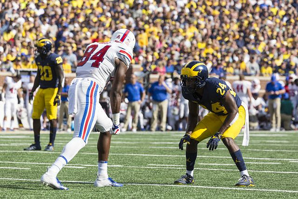 Brad Hawkins (20) and Lavert Hill (24)