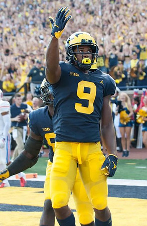 Donovan Peoples-Jones (9) and Nick Eubanks (82)