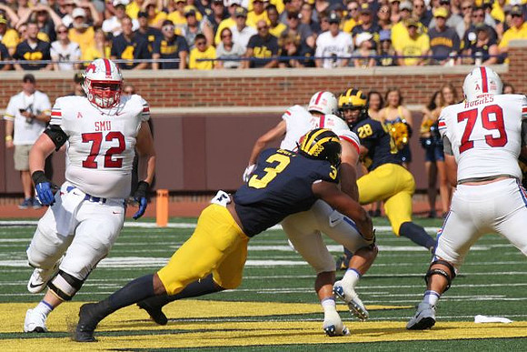 Rashan Gary (3) and Brandon Watson (28)