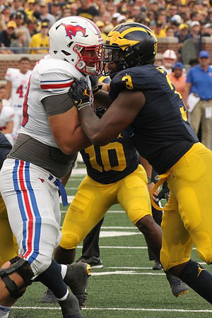 Devin Bush (10) and Rashan Gary (3)