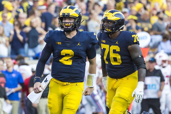 Shea Patterson (2) and Juwann Bushell-Beatty (76)