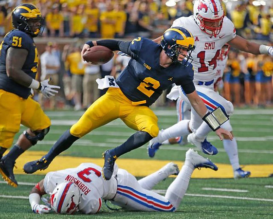 Cesar Ruiz (51) and Shea Patterson (2)