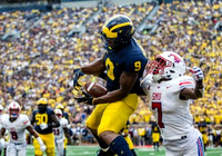 Donovan Peoples-Jones (9) and Michael Onwenu (50)