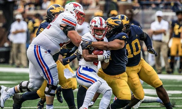 Carlo Kemp (2), Devin Bush (10), and Bryan Mone (90)