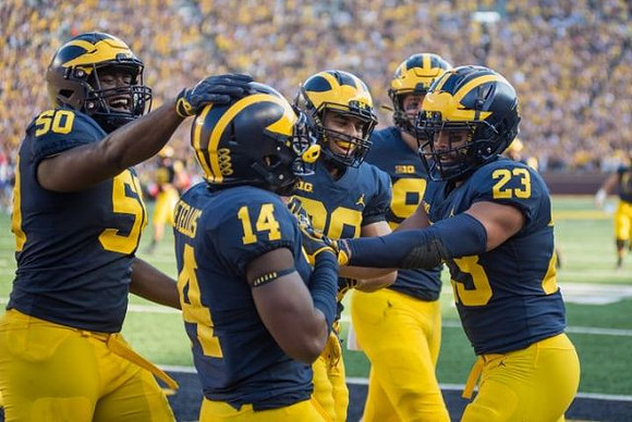 Michael Dwumfour (50), Josh Metellus (14), and Tyree Kinnel (23)