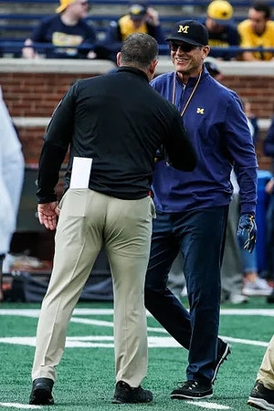Jim Harbaugh, and Rutgers Head Coach Greg Schiano