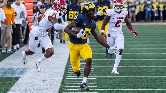 Mike Sainristil (5), Daylen Baldwin (85), and Erick All (83)