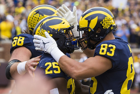 Andrew Vastardis (68), Hassan Haskins (25), and Erick All (83)