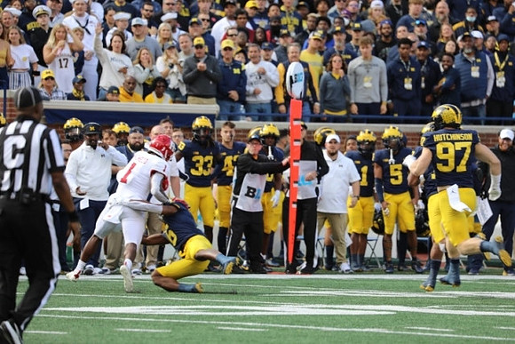R.J. Moten (6), and Aidan Hutchinson (97)