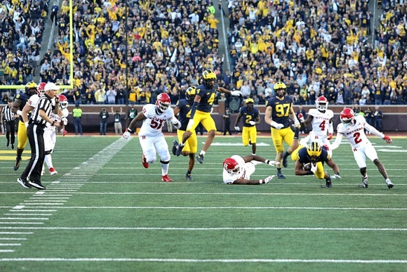 Vincent Gray (4), Brad Hawkins (2), Aidan Hutchinson (97), and Junior Colson (25)